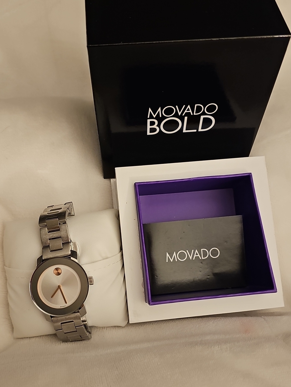 Movado Womens Silver Watch with Rose Gold Accents